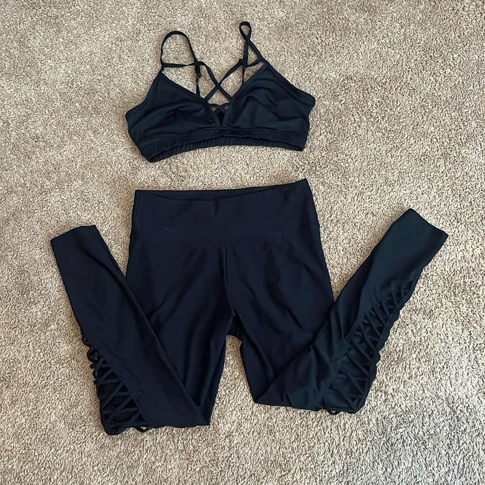 EUC L Ellie black strapoy set cross cross sports bra and high waist leggings